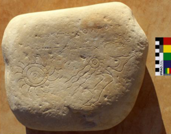 Iron Age petroglyph with Libyco-Berber inscriptions, likely depicting a meteorite fall, found near the High Atlas village of Ida Ou Kazzou