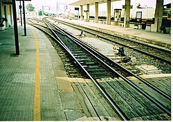 Mixed gauge track at Sassari, Sardinia: 1,435 mm (4 ft 8+1⁄2 in) standard gauge and 950 mm (3 ft 1+3⁄8 in)