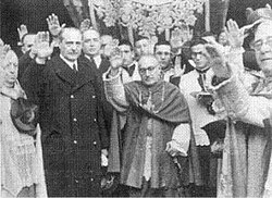 Francoist minister Esteban Bilbao (left) and Catholic archbishop Enrique Pla y Deniel (center) doing the Fascist salute in Toledo Cathedral, Spain, March 1942