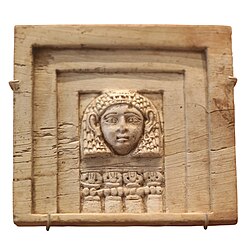 The "woman at the window" on an ivory plaque from Arslan Tash