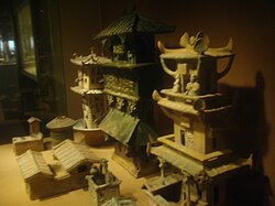 Models of watchtowers and other buildings made during the Eastern Han dynasty (AD 25–220); while these models were made of ceramics, the real versions were made of easily perishable wood and have not survived.