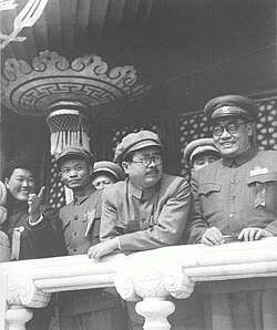 Ren (leaning on railing) attending the first anniversary celebrations of the PRC at Tiananmen on October 1, 1950 - a month before his death