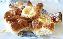 Assorted facturas on a plate.