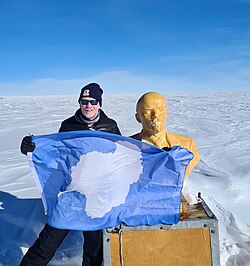 Explorer Chris Brown with the bust of Vladimir Lenin in 2023