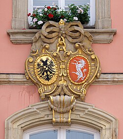 Imperial Eagle and unicorn coat of arms on display at the city hall