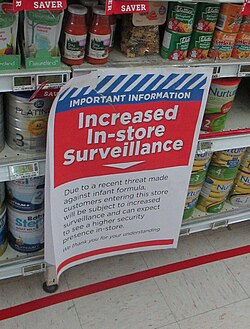 Sign notifying shoppers of increased surveillance due to a perceived increased risk of terrorism