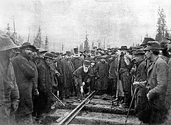 Lord Strathcona drives the Last Spike of the Canadian Pacific Railway, at Craigellachie, November 7, 1885. Completion of the transcontinental railroad was a condition of British Columbia's entry into Confederation.