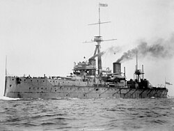 HMS Dreadnought; the 1902, 1904 and 1907 agreements with Japan, France and Russia allowed Britain to refocus resources during the Anglo-German naval arms race.