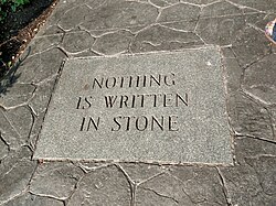 A general example of situational irony: the clause "nothing is written in stone" is, in fact, written in stone.