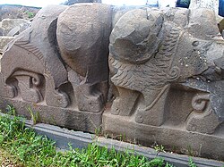 Detail of the outer wall of the Ain Dara temple, showing two lions