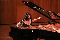 Khatia Buniatishvili playing a grand piano