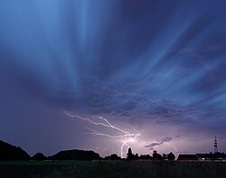 A return stroke, cloud-to-ground lightning strike during a thunderstorm