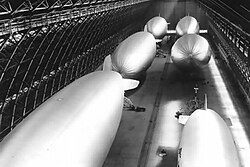 Six helium-filled blimps stored in one of the two hangars at the former US Marine Corps Air Station Tustin