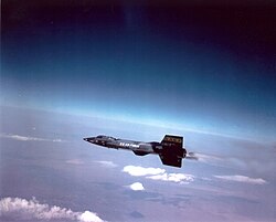 The X-15 (1958–1968) was launched to an altitude of 13.7 km by a B-52 mothership, lifted itself to approximately 100 km, and then glided to the ground.