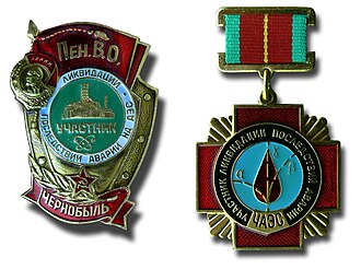 Soviet badge and medal awarded to Chernobyl liquidators