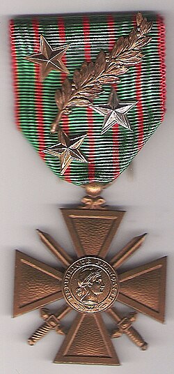 A Croix de Guerre (awarded to Col. Brébant) with four acknowledgments:1 bronze palm1 silver gilt star1 silver star1 bronze star