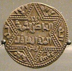 An Ayyubid coin minted in Aleppo bearing the name of Emir al-Zahir
