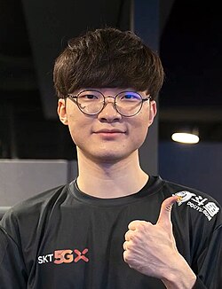 South Korean professional gamer Faker (pictured) cameos on the "Ceremony" music video.