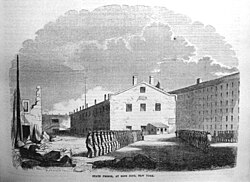 An 1855 engraving of New York's Sing Sing Penitentiary, which also followed the "Auburn (or Congregate) System", where prison cells were placed inside of rectangular buildings that lent themselves more to large-scale penal labor