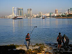 Film team at Port of Dar es Salaam with two ferries