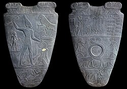 The Narmer Palette depicts the unification of the Two Lands.[24]