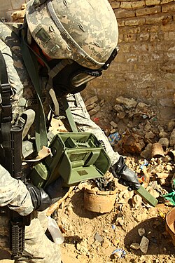 The US army testing the harmful radiation fragments on the ground in Basra, Iraq
