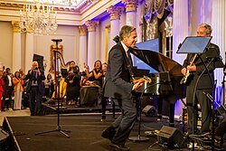 U.S. Secretary of State Antony Blinken performs at the launch of the Global Music Diplomacy Initiative