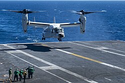 A CMV-22B lands on USS Nimitz in March 2022.