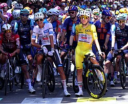 UAE Team Emirates XRG teammates Isaac del Toro (in the white jersey) and Tadej Pogačar (in the yellow jersey) prior to the start of stage 17 in Chambéry