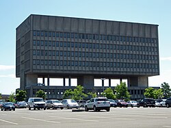 Southeast-facing view showing air gap and columns under the building's upper stories