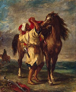 A Moroccan with his Arabian horse along the Barbary coast