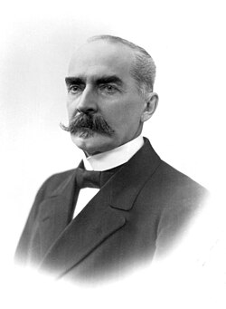 As a liberal nationalist,[180] K. J. Ståhlberg (1865–1952), the President of Finland, anchored the state in liberal democracy, guarded the fragile germ of the rule of law, and embarked on internal reforms.[181]