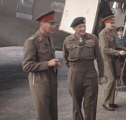With Field Marshal Bernard Montgomery (right), near the front lines in the Netherlands, October 1944