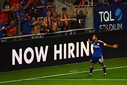 Acosta celebrates after scoring a goal in September 2023.