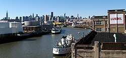Newtown Creek with the Midtown Manhattan skyline in the background