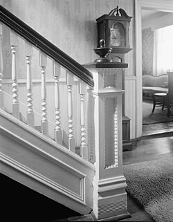 The Herndon Glanton Reeves house, built in 1845 in Troup County, Georgia, was home to several prominent citizens and used as a hospital for both Confederate and Union soldiers during the Civil War. The detail on the staircase newel and on the wall are both common features of antebellum architecture.