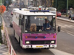 Buses of the Czech prison service are characterised by its white-violet color scheme and absence of windows in the prison section.