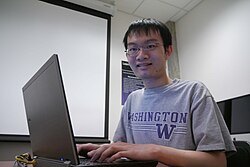 Student using a laptop in an instructional studio.