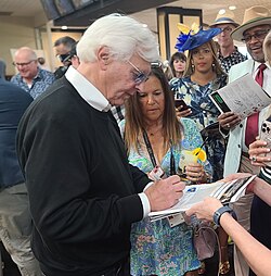 Bob Baffert signs autographs at the Alibi Breakfast at Pimlico Racetrack, two days before the 150th running of the Preakness Stakes, the last held at the original grandstand on May 15, 2025.