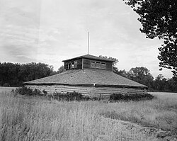 Dance lodge from the Elbowoods area on the Fort Berthold Reservation. Built in 1923, this is a wooden version of the classic Mandan earthwork lodge. This area was flooded in 1951. From the Historic American Engineering Record collection, Library of Congress.