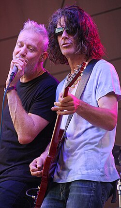 Barron singing with Schenkman playing guitar