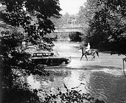 Crossing the Milkhouse ford through Rock Creek, Washington, DC, in 1960
