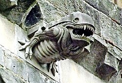 A 1990s gargoyle at Paisley Abbey, Scotland, resembling a Xenomorph[69] parasitoid from the film Alien[70]
