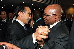 Zuma embraces South Korean President Lee Myung-bak in 2011.
