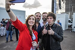 Milei posing with Villarruel and Santiago Abascal in October 2022