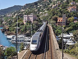 TGV Duplex departing Nice on the Marseille–Ventimiglia railway. The service towards the north runs on the classic line until Marseille, when it joins the LGV Méditerranée. The proposed LGV PACA allows for extending the high-speed service to Nice.