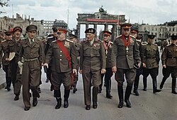 Front row, from right to left: Rokossovsky, Montgomery and Zhukov at the Brandenburg Gate