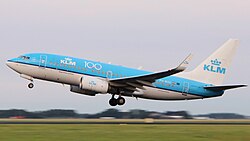 KLM Boeing 737-700 in centennial livery taking off from Amsterdam Schiphol Airport