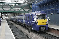 A train preparing to depart from Edinburgh Waverley station