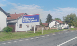 2019 election "Do you know how it is to be a Serb in Croatia?" jumbo poster in Vukovar with added graffiti stating "To be above the law".